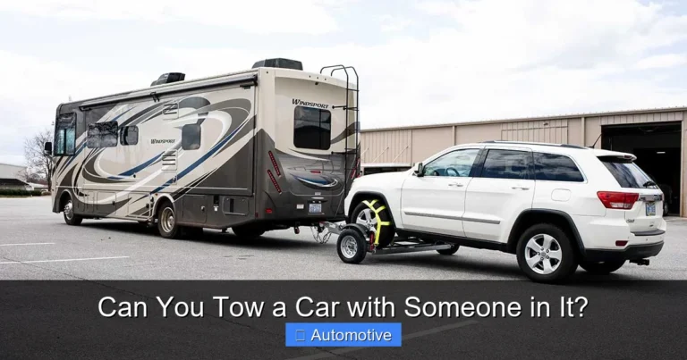 Can You Tow a Car with Someone in It?