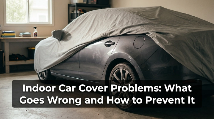 Indoor car cover problems shown on a garage-stored sedan with dust and paint-contact risks.