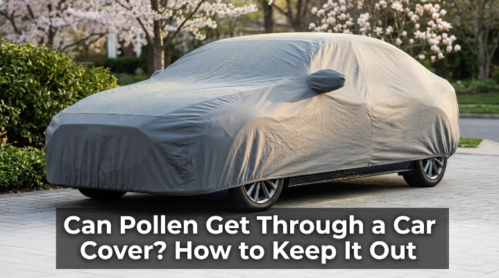 Fitted car cover outdoors with pollen collecting on fabric and near the lower vehicle edge